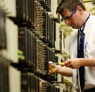 BT engineer working at an exchange